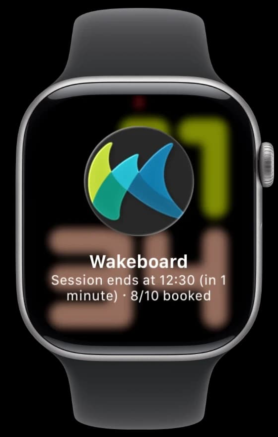 A notification on the watch: Wakeboard, session ends at 12:30, in 1 minute, 8/10 booked